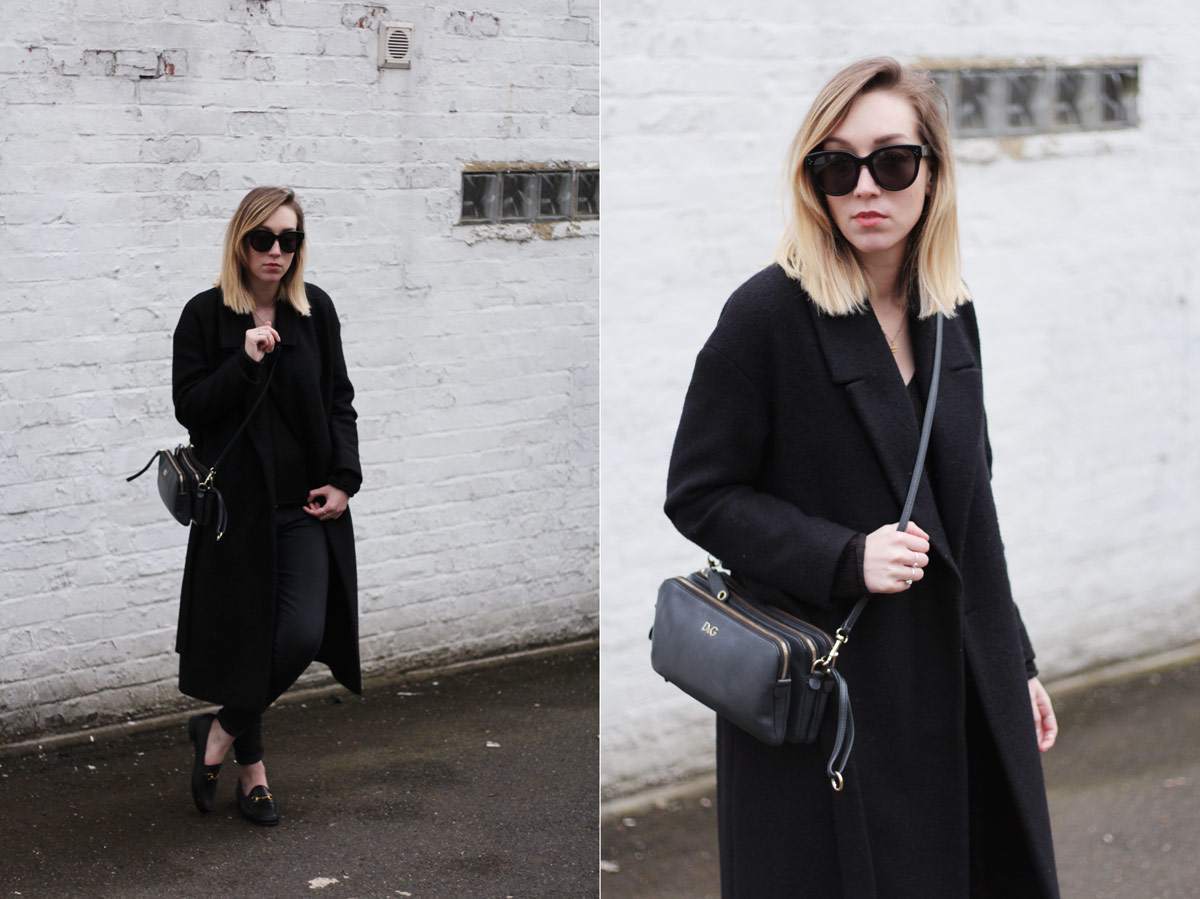 staple-all-black-look-gucci-loafers-cos-belted-coat-d&g-bag